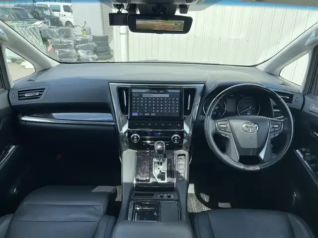 トヨタ アルファードハイブリット SR Cパッケージ 富山県 2019(令1)年 2.6万km ダークレッドマイカメタリック 純正10インチナビ＆フルセグTV/（BT＆CD＆DVD＆USB＆SD)/サンルーフ/後席モニター/デジタルインナーミラー/バックカメラ/レーダークルーズコントロール/前席（パワーシート＆シートヒーター＆エアシート）/前後ドラレコ/ウッドコンビステアリング/ステアリングヒーター/オットマン/三眼ヘッドライト/BSM/オートライト/LEDライト/シーケンシャルウィンカー/ビルトインETC