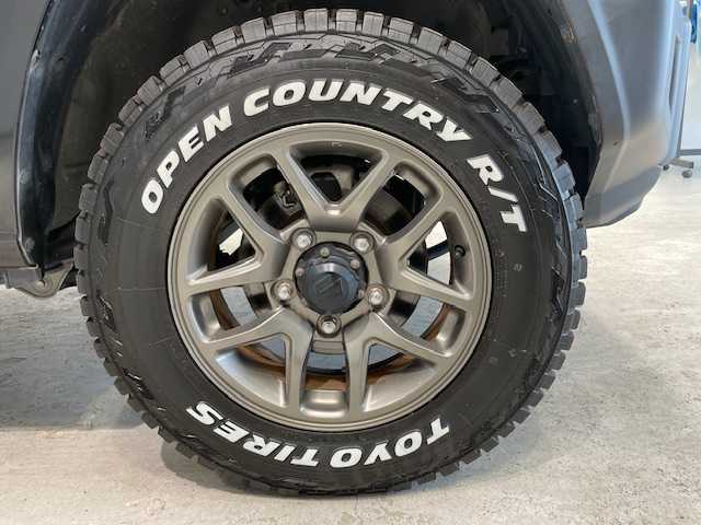 スズキ ジムニー XC 宮城県 2019(令1)年 3.7万km ブルーイッシュブラックパール3 4WD/スズキセーフティーサポート/・デュアルセンサーブレーキサポート/・車線逸脱警報機能/・標識認識機能/・ハイビームアシスト/・誤発進抑制機能/・ふらつき警報機能/・先行者発進お知らせ機能/車両走行安定補助システム/エマージェンシーストップシグナル/ヒルホードコントロール/ヒルディセントコントロール/クルーズコントロール/リヤパーキングセンサー/後席シートベルトリマインダー/LEDオートライト/ライト自動消灯システム/サイドアンダーミラー付きドアミラー/ヒーテッドドアミラー/ヘッドライプウォッシャー/盗難防止装置/純正アルミホイール/シートカバー/LEDテールランプ/社外フロントグリル