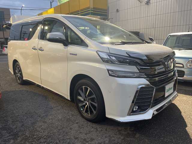 トヨタ ヴェルファイア ハイブリット ZR 神奈川県 2017(平29)年 1.8万km ホワイトパールクリスタルシャイン ワンオーナー/4WD/ダブルサンルーフ/JBLプレミアムサウンドシステム/純正フリップダウンモニター/メーカーナビ/フルセグTV/バックカメラ/プリクラッシュセーフティシステム/運転席パワーシート/パワーバックドア/両側パワースライドドア/社外空気圧センサー/レーダークルーズコントロール/ビルトインETC2.0/ドライブレコーダー/社外AW付スタッドレスタイヤ4本積込/スマートキー　2本/保証書/取扱説明書