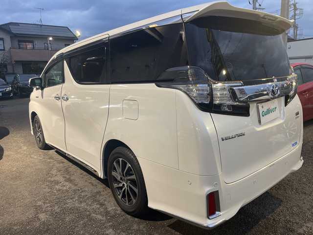 トヨタ ヴェルファイア ハイブリット ZR 神奈川県 2017(平29)年 1.8万km ホワイトパールクリスタルシャイン ワンオーナー/4WD/ダブルサンルーフ/JBLプレミアムサウンドシステム/純正フリップダウンモニター/メーカーナビ/フルセグTV/バックカメラ/プリクラッシュセーフティシステム/運転席パワーシート/パワーバックドア/両側パワースライドドア/社外空気圧センサー/レーダークルーズコントロール/ビルトインETC2.0/ドライブレコーダー/社外AW付スタッドレスタイヤ4本積込/スマートキー　2本/保証書/取扱説明書