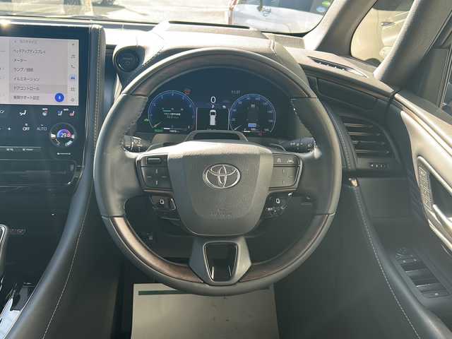 トヨタ ヴェルファイア ハイブリット Z プレミア 神奈川県 2023(令5)年 2万km プラチナホワイトパールマイカ ワンオーナー/サンルーフ/ユニバーサルステップ/純正ナビ(USB/BT/HDMI/フルセグTV/Miracast)/パノラミックビューモニター/純正12.1型フリップダウンモニター/電動サイドシェード/トヨタセーフティセンス/ブラインドスポットモニター/クリアランスソナー/パドルシフト/1500W電源/黒革シート/シートヒーター/シートクーラー/パワーシート/ステアリングヒーター/置くだけ充電/ヘッドアップディスプレイ/パワーバックドア/両側パワースライドドア/デジタルインナーミラー/ビルトインETC2.0/前後ドライブレコーダー/純正フロアマット/純正ドアバイザー/オートミラー/ISOFIX/スペアキー×1