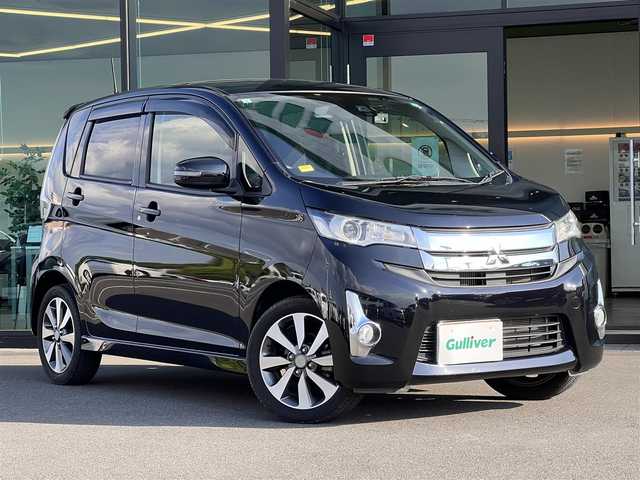 三菱 ｅＫカスタム T e－アシスト 東京都 2015(平27)年 1.8万km アメジストブラック 純正ナビ【MC314D-WM】/バックカメラ/ETC/HIDライト/フォグランプ/純正15インチAW/純正フロアマット/スマートキー/プッシュスタート/取扱説明書/保証書/インテリキースペア×１