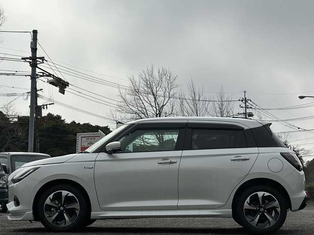 スズキ スイフト HYBRID MZ 大分県 2024(令6)年 0.1万km未満 ピュアホワイトP 登録済み未使用車/全方位カメラ/純正ディスプレイオーディオ/純正16インチアルミホイール/純正LEDヘッドライト/シートヒーター/オートホールド/ステアリングリモコン/5月3日から5月7日までお休みの為、書類発送及び車両搬出は5月8日以降になります。
