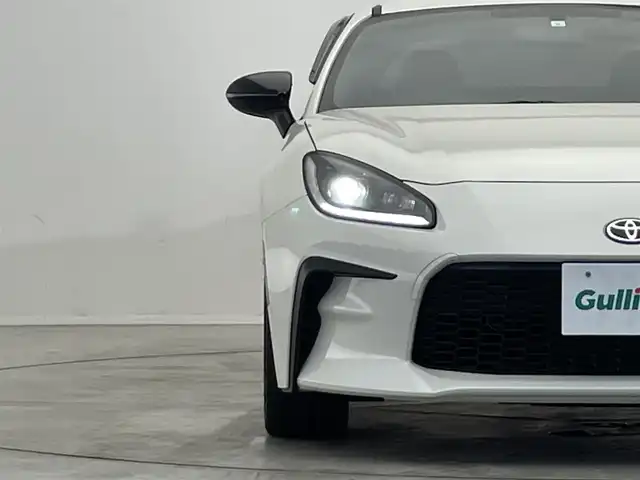 トヨタ ＧＲ８６ RZ 滋賀県 2023(令5)年 0.7万km クリスタルホワイトパール 社外９型ナビ/・Ｂｌｕｅｔｏｏｔｈ/ＨＤＭＩ/フルセグ/AUX//バックカメラ/純正ＬＥＤヘッドライト/オートライト/ハーフレザーシート/前席シートヒーター/クルーズコントロール/ステアリング連動ヘッドライト/革巻ステアリング/純正１８インチAW/スマートキー/ETC/純正フロアマット