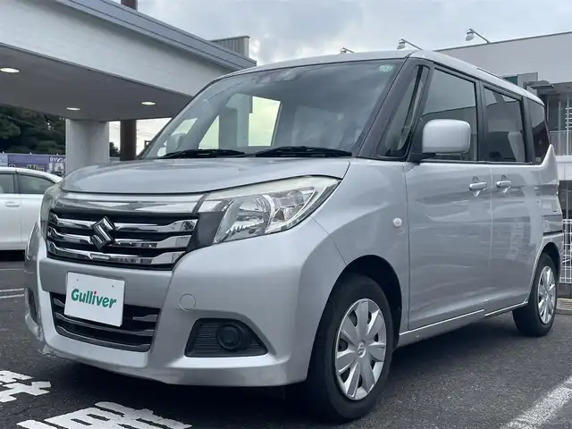 スズキ ソリオ G 長崎県 2020(令2)年 8.3万km スターシルバーメタリック ・プッシュスタート/・社外SDナビ（AM/FM/DVD）/・ブルートゥース/・クルーズコントロール/・ステアリングスイッチ/・バックカメラ/・ETC/・横滑り防止装置/・電格ミラー/・コーナーセンサー（後）/・衝突軽減ブレーキ/・片側パワースライドドア/・オートライト