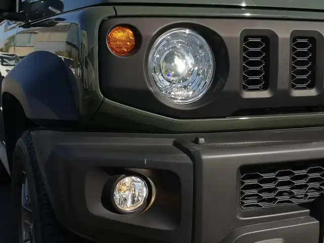 スズキ ジムニー シエラ JC 茨城県 2022(令4)年 1.5万km ジャングルグリーン 社外ナビ/【DISC・SD・ラジオ・TV・BT・iPod・USB・HDMI・AUX】/シートヒーター/ETC2.0/クルコン/ダウンヒルアシストコントロール/４WD/アイドリングストップ/オートライト/オートハイビーム/Fフォグ/LEDライト/ヘッドライトウォッシャー/横滑り防止装置/レーンキープアシスト/衝突被害軽減システム