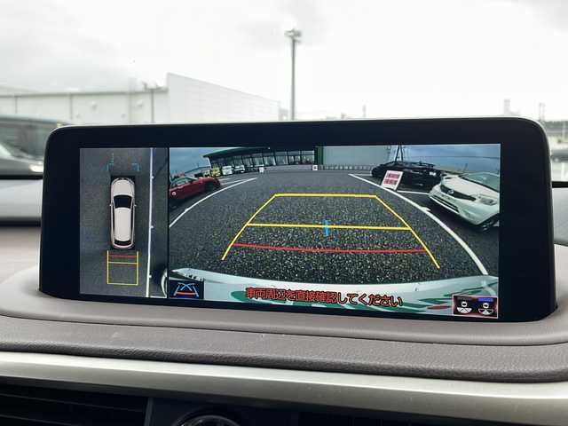 レクサス ＲＸ 450h バージョンL 島根県 2019(令1)年 7.7万km ソニックチタニウム 純正12.3インチメモリナビ/(CD DVD フルセグTV Bluetooth)/パラレルサンルーフ/全方位カメラ/４WD/レクサスセーフティ/・衝突軽減ブレーキ/・車線逸脱警報/・レーントレーシングアシスト/・レーダークルーズコントロール/・ブラインドスポットモニター/・道路標識認識機能/茶革シート/パワーシート/シートヒーター・エアシート/パワーバックドア/ウッドコンビステアリング/ステアリングヒーター/ステアリングリモコン/パドルシフト/置くだけ充電/ドライブレコーダー/ETC2.0/プッシュスタート/電動パーキングブレーキ/オートブレーキホールド/純正フロアマット/LEDヘッドライト/オートライト/オートマチックハイビーム