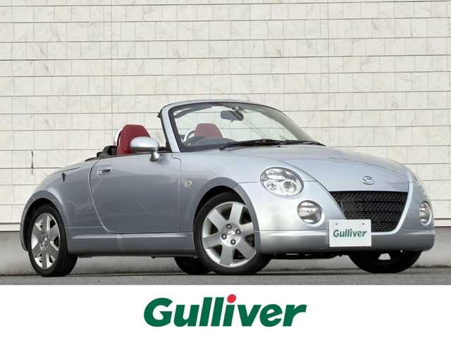 ダイハツ コペン アクティブトップ 岩手県 2002(平14)年 2.2万km ブライトシルバーメタリック 禁煙車/5MT/赤レザーシート/momoステアリング/ファッションバー/前席シートヒーター/電動オープン/フォグライト/〇キーレス/〇電動ミラー/〇社外フロアマット/〇シガーソケット/〇パワーウィンドウ/〇パワーステアリング/取扱説明書