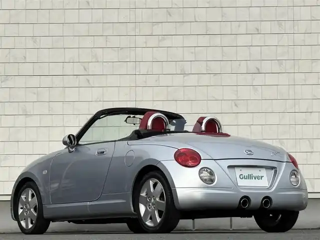 ダイハツ コペン アクティブトップ 岩手県 2002(平14)年 2.2万km ブライトシルバーメタリック 禁煙車/5MT/赤レザーシート/momoステアリング/ファッションバー/前席シートヒーター/電動オープン/フォグライト/〇キーレス/〇電動ミラー/〇社外フロアマット/〇シガーソケット/〇パワーウィンドウ/〇パワーステアリング/取扱説明書