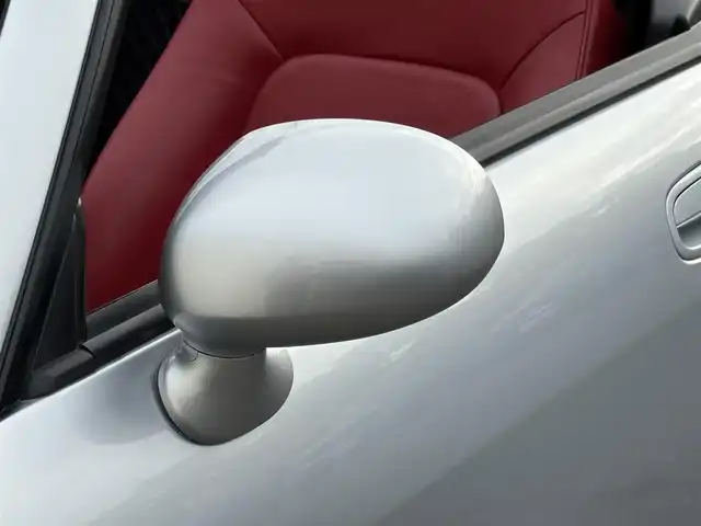 ダイハツ コペン アクティブトップ 岩手県 2002(平14)年 2.2万km ブライトシルバーメタリック 禁煙車/5MT/赤レザーシート/momoステアリング/ファッションバー/前席シートヒーター/電動オープン/フォグライト/〇キーレス/〇電動ミラー/〇社外フロアマット/〇シガーソケット/〇パワーウィンドウ/〇パワーステアリング/取扱説明書