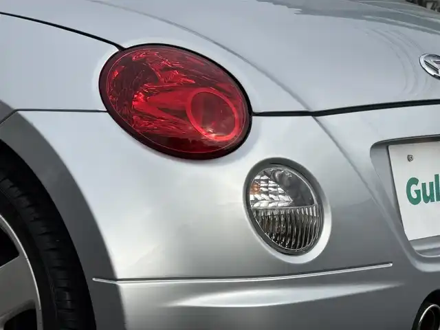 ダイハツ コペン アクティブトップ 岩手県 2002(平14)年 2.2万km ブライトシルバーメタリック 禁煙車/5MT/赤レザーシート/momoステアリング/ファッションバー/前席シートヒーター/電動オープン/フォグライト/〇キーレス/〇電動ミラー/〇社外フロアマット/〇シガーソケット/〇パワーウィンドウ/〇パワーステアリング/取扱説明書