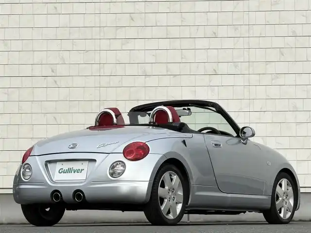 ダイハツ コペン アクティブトップ 岩手県 2002(平14)年 2.2万km ブライトシルバーメタリック 禁煙車/5MT/赤レザーシート/momoステアリング/ファッションバー/前席シートヒーター/電動オープン/フォグライト/〇キーレス/〇電動ミラー/〇社外フロアマット/〇シガーソケット/〇パワーウィンドウ/〇パワーステアリング/取扱説明書