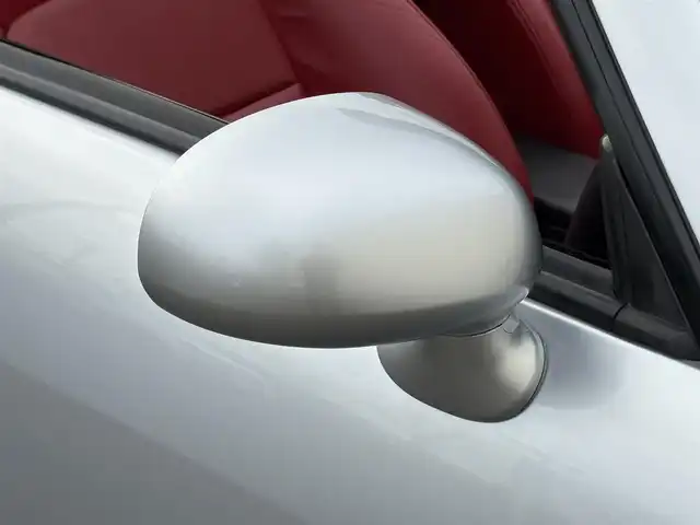 ダイハツ コペン アクティブトップ 岩手県 2002(平14)年 2.2万km ブライトシルバーメタリック 禁煙車/5MT/赤レザーシート/momoステアリング/ファッションバー/前席シートヒーター/電動オープン/フォグライト/〇キーレス/〇電動ミラー/〇社外フロアマット/〇シガーソケット/〇パワーウィンドウ/〇パワーステアリング/取扱説明書