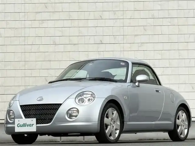 ダイハツ コペン アクティブトップ 岩手県 2002(平14)年 2.2万km ブライトシルバーメタリック 禁煙車/5MT/赤レザーシート/momoステアリング/ファッションバー/前席シートヒーター/電動オープン/フォグライト/〇キーレス/〇電動ミラー/〇社外フロアマット/〇シガーソケット/〇パワーウィンドウ/〇パワーステアリング/取扱説明書