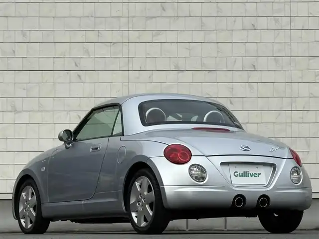 ダイハツ コペン アクティブトップ 岩手県 2002(平14)年 2.2万km ブライトシルバーメタリック 禁煙車/5MT/赤レザーシート/momoステアリング/ファッションバー/前席シートヒーター/電動オープン/フォグライト/〇キーレス/〇電動ミラー/〇社外フロアマット/〇シガーソケット/〇パワーウィンドウ/〇パワーステアリング/取扱説明書