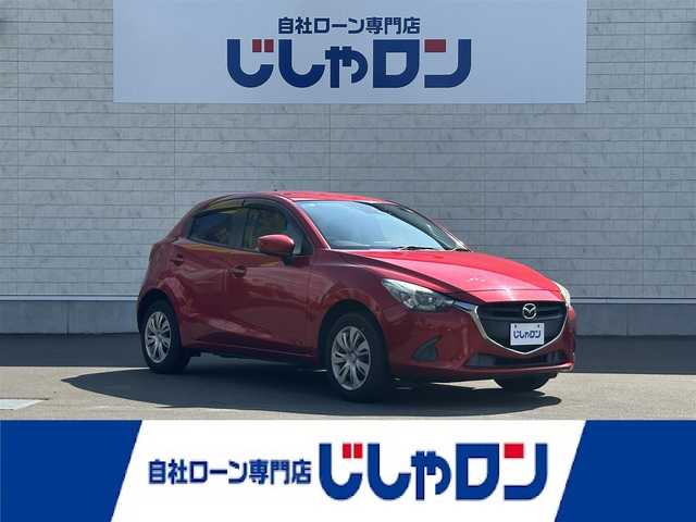 マツダ デミオ 13S 道北・旭川 2015(平27)年 9.2万km ソウルレッドプレミアムメタリック (株)IDOMが運営する【じしゃロン旭川店】の自社ローン専用車両になります。こちらは現金またはオートローンご利用時の価格です。自社ローンご希望の方は別途その旨お申付け下さい/　/・純正ナビ(CD/DVD/BT/フルセグ)/・バックカメラ/・ETC/・ドライブレコーダー/・レーダーブレーキ/・ステアリングリモコン/・プッシュスタート/・スマートキー2個/・取扱説明書