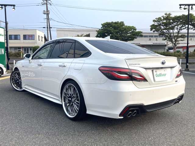 トヨタ クラウン ハイブリッド RS 鳥取県 2018(平30)年 6.7万km ホワイトパールクリスタルシャイン 純正ナビ/フルセグ/DVD/CD/BT/バックカメラ・ビルトインETC/トヨタセーフティセンス/レーダークルーズコントロール/レーンキープアシスト/前後クリアランスソナー/ドライブレコーダー（前方）/レザー調シートカバー/前席シートヒーター/パワーシート/LEDヘットライト/WORK２０インチアルミホイール/ローダウンスプリング/プッシュエンジンスタート/４本出しマフラー/フロアマット・ドアバイザー