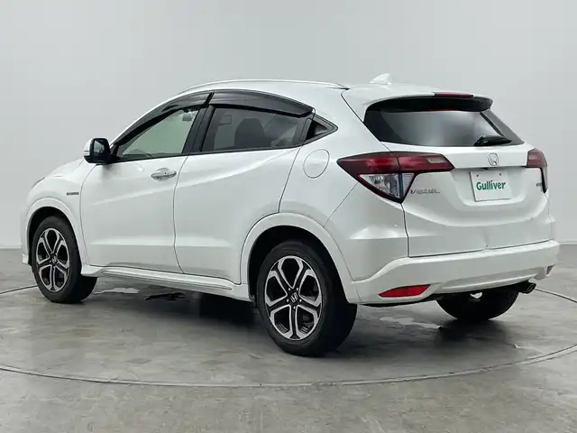 ホンダ ヴェゼル ハイブリッド Z ホンダセンシング 群馬県 2016(平28)年 7.6万km ホワイトオーキッドパール 純正メーカーナビ/バックカメラ/ホンダセンシング/ステアリングスイッチ/ドアバイザー/革巻きステアリング/ETC/ハーフレザーシート/シートヒーター/電動格納ミラー/前後ドライブレコーダー/純正フロアマット/純正アルミホイール/レーンキープアシスト/オートライト/LEDヘッドライト/プッシュスタート/レーダークルーズコントロール