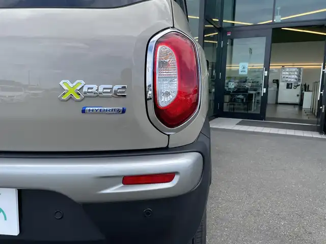 スズキ クロスビー HYBRID MZ 東京都 2024(令6)年 0.6万km キャラバンアイボリーパールメタリック/メロウディープレッド2トーン スズキセーフティサポート/・デュアルカメラブレーキサポート/・車線逸脱警報機能/・先行車発進お知らせ機能/・誤発進抑制機能/・アダプティブクルーズコントロール/・コーナーセンサー/プッシュスタート/アイドリングストップ/パドルシフト/社外メモリナビ/フルセグTV/ETC/前後ドライブレコーダー/シートヒーター/パーソナルテーブル/LEDヘッドライト/オートライト/ドアバイザー/16インチ純正アルミホイール/スマートキー