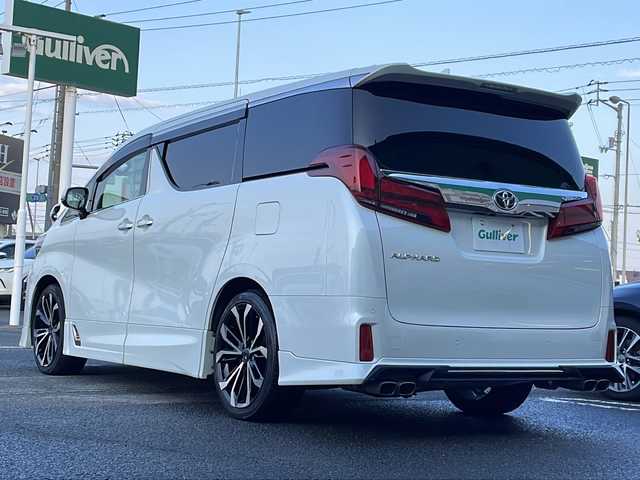 トヨタ アルファード S Cパッケージ 徳島県 2021(令3)年 3.2万km ホワイトパールクリスタルシャイン 純正ナビ/（ラジオ/DISC/BT/フルセグ/USB）/12.1型フリップダウンモニター/デジタルインナーミラー/TRDエアロ/追従式クルーズコントロール/ETC/D/N席パワーシート/シートメモリ/ドライブレコーダー/自動パーキングブレーキ/LEDヘッドライト/モデリスタ20インチアルミホイール/オートブレーキホールド/ドアバイザー/両側電動スライドドア