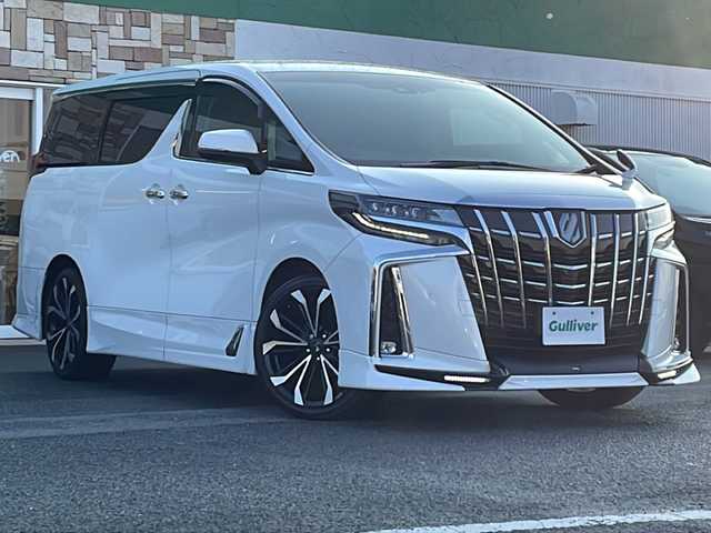 トヨタ アルファード S Cパッケージ 徳島県 2021(令3)年 3.2万km ホワイトパールクリスタルシャイン 純正ナビ/（ラジオ/DISC/BT/フルセグ/USB）/12.1型フリップダウンモニター/デジタルインナーミラー/TRDエアロ/追従式クルーズコントロール/ETC/D/N席パワーシート/シートメモリ/ドライブレコーダー/自動パーキングブレーキ/LEDヘッドライト/モデリスタ20インチアルミホイール/オートブレーキホールド/ドアバイザー/両側電動スライドドア