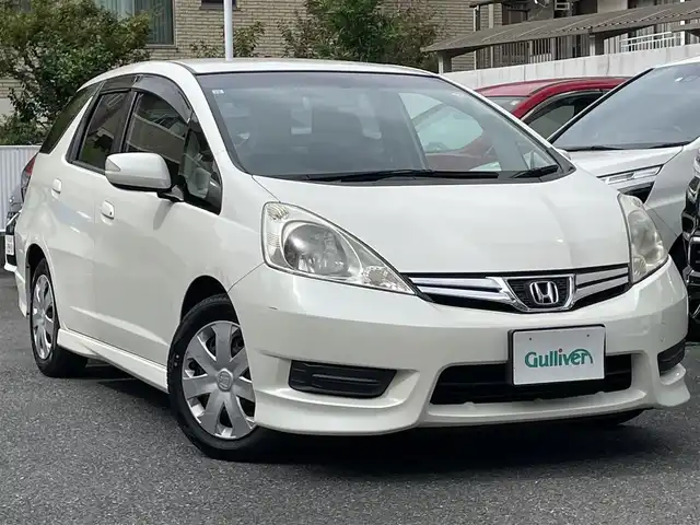 ホンダ フィット シャトル 15X 埼玉県 2011(平23)年 1.8万km プレミアムホワイトパール 登録時12946ｋｍ/ワンオーナー/純正ナビ（ワンセグTV)/　・CD/DVD/USB/バックカメラ/ハーフレザーシート/HID/ETC/横滑り防止/スマートキー/ECON/ステアリングスイッチ/ウィンカーミラー/シートリフター/純正フロアマット/純正ドアバイザー/保証書/ナビ取扱説明書/取扱説明書