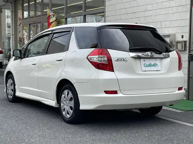 ホンダ フィット シャトル 15X 埼玉県 2011(平23)年 1.8万km プレミアムホワイトパール 登録時12946ｋｍ/ワンオーナー/純正ナビ（ワンセグTV)/　・CD/DVD/USB/バックカメラ/ハーフレザーシート/HID/ETC/横滑り防止/スマートキー/ECON/ステアリングスイッチ/ウィンカーミラー/シートリフター/純正フロアマット/純正ドアバイザー/保証書/ナビ取扱説明書/取扱説明書