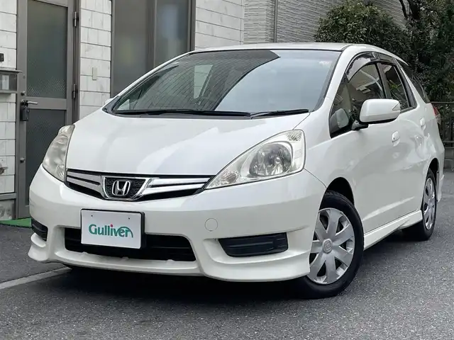 ホンダ フィット シャトル 15X 埼玉県 2011(平23)年 1.8万km プレミアムホワイトパール 登録時12946ｋｍ/ワンオーナー/純正ナビ（ワンセグTV)/　・CD/DVD/USB/バックカメラ/ハーフレザーシート/HID/ETC/横滑り防止/スマートキー/ECON/ステアリングスイッチ/ウィンカーミラー/シートリフター/純正フロアマット/純正ドアバイザー/保証書/ナビ取扱説明書/取扱説明書