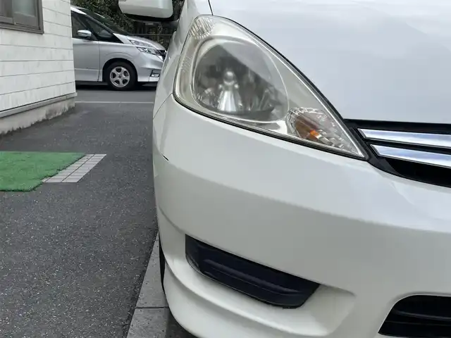 ホンダ フィット シャトル 15X 埼玉県 2011(平23)年 1.8万km プレミアムホワイトパール 登録時12946ｋｍ/ワンオーナー/純正ナビ（ワンセグTV)/　・CD/DVD/USB/バックカメラ/ハーフレザーシート/HID/ETC/横滑り防止/スマートキー/ECON/ステアリングスイッチ/ウィンカーミラー/シートリフター/純正フロアマット/純正ドアバイザー/保証書/ナビ取扱説明書/取扱説明書