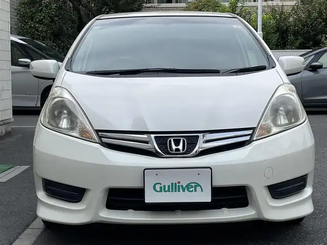 ホンダ フィット シャトル 15X 埼玉県 2011(平23)年 1.8万km プレミアムホワイトパール 登録時12946ｋｍ/ワンオーナー/純正ナビ（ワンセグTV)/　・CD/DVD/USB/バックカメラ/ハーフレザーシート/HID/ETC/横滑り防止/スマートキー/ECON/ステアリングスイッチ/ウィンカーミラー/シートリフター/純正フロアマット/純正ドアバイザー/保証書/ナビ取扱説明書/取扱説明書