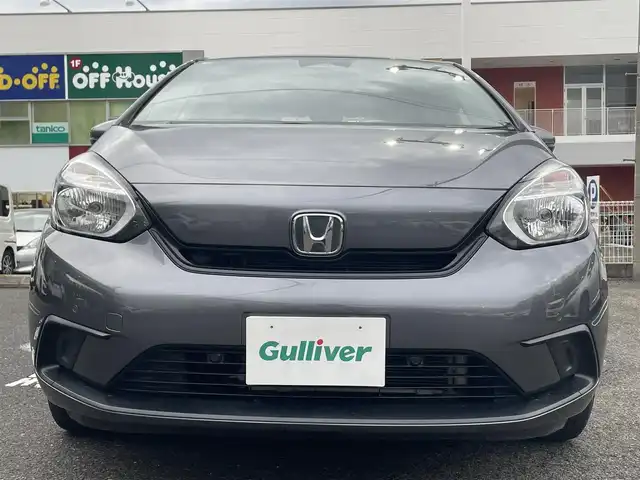 ホンダ フィット ベーシック 長崎県 2020(令2)年 6.6万km シャイニンググレーM ワンオーナー/プッシュスタート/社外SDナビ（AM/FM/DVD/SD）/ブルートゥース/ETC/クルーズコントロール（追従有）/ブレーキホールド/アイドリングストップ/USB/横滑り防止装置/衝突軽減ブレーキ/コーナーセンサー（前後）/ステアリングスイッチ/車線逸脱抑制装置/踏み間違い衝突軽減/電格ミラー/レーンキープアシスト/ブレーキホールド/スペアキー/取説/保証書