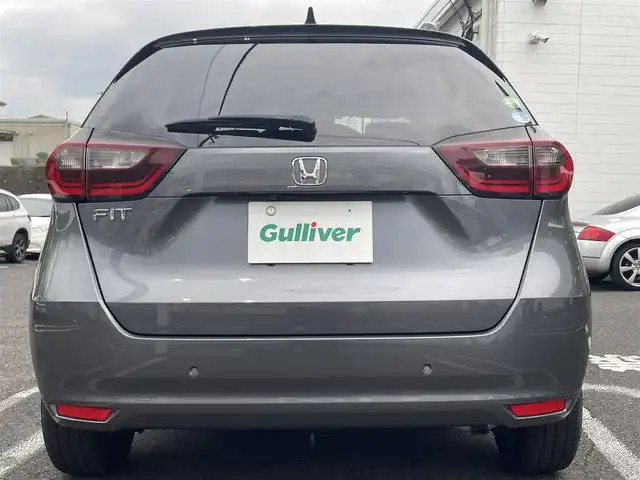 ホンダ フィット ベーシック 長崎県 2020(令2)年 6.6万km シャイニンググレーM ワンオーナー/プッシュスタート/社外SDナビ（AM/FM/DVD/SD）/ブルートゥース/ETC/クルーズコントロール（追従有）/ブレーキホールド/アイドリングストップ/USB/横滑り防止装置/衝突軽減ブレーキ/コーナーセンサー（前後）/ステアリングスイッチ/車線逸脱抑制装置/踏み間違い衝突軽減/電格ミラー/レーンキープアシスト/ブレーキホールド/スペアキー/取説/保証書