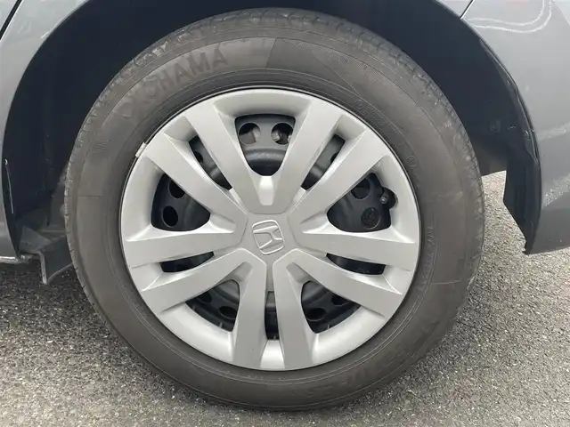 ホンダ フィット ベーシック 長崎県 2020(令2)年 6.6万km シャイニンググレーM ワンオーナー/プッシュスタート/社外SDナビ（AM/FM/DVD/SD）/ブルートゥース/ETC/クルーズコントロール（追従有）/ブレーキホールド/アイドリングストップ/USB/横滑り防止装置/衝突軽減ブレーキ/コーナーセンサー（前後）/ステアリングスイッチ/車線逸脱抑制装置/踏み間違い衝突軽減/電格ミラー/レーンキープアシスト/ブレーキホールド/スペアキー/取説/保証書