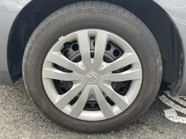 ホンダ フィット ベーシック 長崎県 2020(令2)年 6.6万km シャイニンググレーM ワンオーナー/プッシュスタート/社外SDナビ（AM/FM/DVD/SD）/ブルートゥース/ETC/クルーズコントロール（追従有）/ブレーキホールド/アイドリングストップ/USB/横滑り防止装置/衝突軽減ブレーキ/コーナーセンサー（前後）/ステアリングスイッチ/車線逸脱抑制装置/踏み間違い衝突軽減/電格ミラー/レーンキープアシスト/ブレーキホールド/スペアキー/取説/保証書