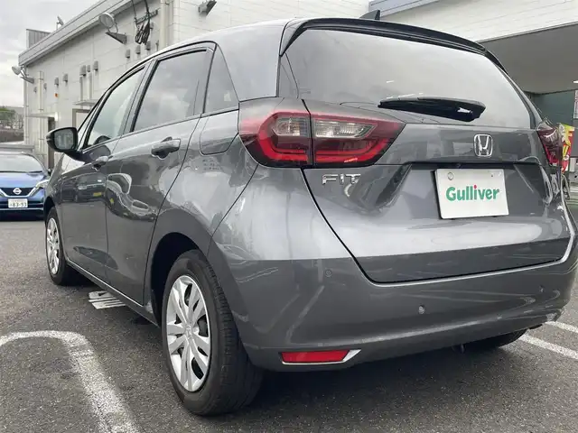 ホンダ フィット ベーシック 長崎県 2020(令2)年 6.6万km シャイニンググレーM ワンオーナー/プッシュスタート/社外SDナビ（AM/FM/DVD/SD）/ブルートゥース/ETC/クルーズコントロール（追従有）/ブレーキホールド/アイドリングストップ/USB/横滑り防止装置/衝突軽減ブレーキ/コーナーセンサー（前後）/ステアリングスイッチ/車線逸脱抑制装置/踏み間違い衝突軽減/電格ミラー/レーンキープアシスト/ブレーキホールド/スペアキー/取説/保証書