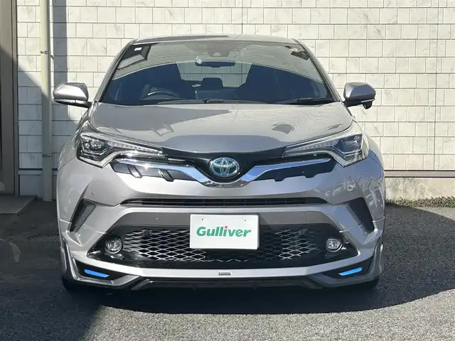 トヨタ Ｃ－ＨＲ G 大分県 2019(平31)年 12.4万km メタルストリームM ・ワンオーナー/Toyota Safety Sense /　プリクラッシュセーフティシステム（歩行者検知機能付/ 　衝突回避支援タイプ/   ミリ波レーダー＋単眼カメラ方式）/　レーンディパーチャーアラート（ステアリング制御付）/　オートマチックハイビーム/　レーダークルーズコントロール（全車速追従機能付）/・純正ナビ　NSZT-Y68T/　ワンセグテレビ/　BT/　DVD/　SD/　ラジオ/・モデリスタフルエアロ/・プッシュエンジンスタート/・ETC/・ヒートシーター　運転席/助手席/・ブラインドスポットモニター/・電動ランバーサポート　運転席/・オートワイパー（雨滴感応式）/・ドラレコ前 DRT-C68A/・ステアリングスイッチ/・横滑り防止システム/・ウィンカーミラー/・LEDランプ/・革巻きステアリング/・レベライザー/・プライバシーガラス/・革巻きステアリング/・トノカバー/・純正フロアマット/・純正18インチアルミホイル/・ドアバイザー/・保証書/・取扱説明書/・スペアキー２本/　