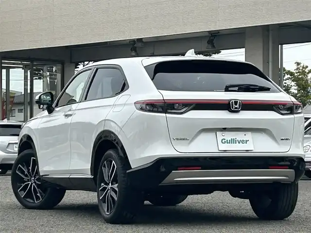 ホンダ ヴェゼル ハイブリッド e:HEV Z 宮城県 2023(令5)年 2.1万km プラチナホワイトパール /ワンオーナー//純正メモリナビ//BT/USB/FM/AM/フルセグテレビ//スマートフォン連携//ハーフレザーシート//前席シートヒーター/ステアリングヒーター//パワーバックドア//バックカメラ//ワイヤレス充電//ビルトインETC2.0//レーダークルーズコントロール//パドルシフト//衝突被害軽減ブレーキ//レーンキープアシスト//スマートキーx2