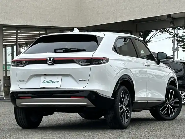 ホンダ ヴェゼル ハイブリッド e:HEV Z 宮城県 2023(令5)年 2.1万km プラチナホワイトパール /ワンオーナー//純正メモリナビ//BT/USB/FM/AM/フルセグテレビ//スマートフォン連携//ハーフレザーシート//前席シートヒーター/ステアリングヒーター//パワーバックドア//バックカメラ//ワイヤレス充電//ビルトインETC2.0//レーダークルーズコントロール//パドルシフト//衝突被害軽減ブレーキ//レーンキープアシスト//スマートキーx2