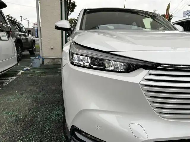 ホンダ ヴェゼル ハイブリッド e:HEV Z 宮城県 2023(令5)年 2.1万km プラチナホワイトパール /ワンオーナー//純正メモリナビ//BT/USB/FM/AM/フルセグテレビ//スマートフォン連携//ハーフレザーシート//前席シートヒーター/ステアリングヒーター//パワーバックドア//バックカメラ//ワイヤレス充電//ビルトインETC2.0//レーダークルーズコントロール//パドルシフト//衝突被害軽減ブレーキ//レーンキープアシスト//スマートキーx2