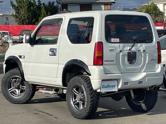 スズキ ジムニー ランドベンチャー 山口県 2018(平30)年 2万km パール ンオーナー　/２．５インチリフトアップ　/オーバーフェンダー　/黒ハーフレザーシート　/社外ナビ　/　・フルセグＴＶ　/　・Ｂｌｕｅｔｏｏｔｈ　/　・バックカメラ　/ドライブレコーダー　/シートヒーター　/純正１６インチＡＷ