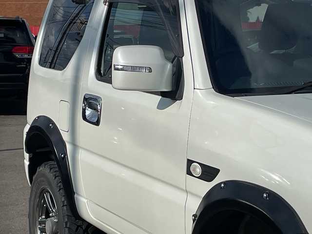 スズキ ジムニー ランドベンチャー 山口県 2018(平30)年 2万km パール ンオーナー　/２．５インチリフトアップ　/オーバーフェンダー　/黒ハーフレザーシート　/社外ナビ　/　・フルセグＴＶ　/　・Ｂｌｕｅｔｏｏｔｈ　/　・バックカメラ　/ドライブレコーダー　/シートヒーター　/純正１６インチＡＷ