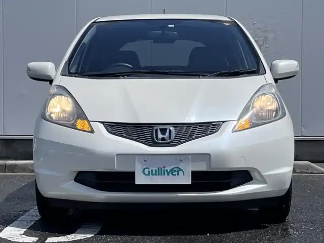 ホンダ フィット G 三重県 2008(平20)年 6.3万km プレミアムホワイトパール 純正ナビ(CD/FM/AM/MUSIC RACK)/バックカメラ/シートリフター/チップアップシート(後席)/純正フロアマット/ドアバイザー/電動格納ドアミラー/チルトステアリング/バニティミラー/スペアキー