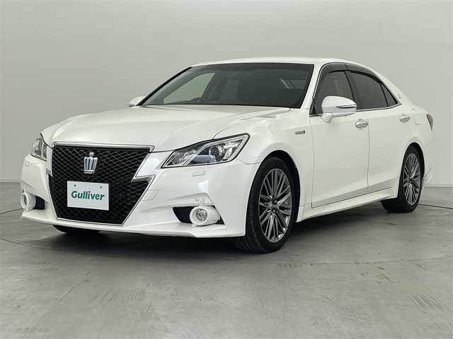 トヨタ クラウン ハイブリッド アスリートG 群馬県 2014(平26)年 11.7万km ホワイトパールクリスタルシャイン パノラミックビューモニター/225/45R18 91Wタイヤ+18×8Jアルミホイール(スパッタリング塗装)/センターオーナメント/＝＝＝＝＝/純正8インチHDDナビ/・USB/Bluetooth/CD/DVD/AM/FM/TV/トヨタマルチオペレーションタッチ（５インチ）/前席シートヒーター/シートベンチレーション/ステアリングヒーター/前後クリアランスソナー/クルーズコントロール/バイキセノン式ヘッドライト（オートレベリング機能/LEDクリアランスランプ付）/左右独立温度コントロールシステムフルオートエアコン（前席集中モード付）/プッシュスタート/スマートキー/ビルトインETC/防眩インナーミラー