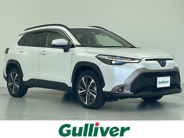 トヨタ カローラ クロス ハイブリッド Z 愛知県 2022(令4)年 1.8万km プラチナホワイトパールマイカ 純正ディスプレイオーディオ(現状ナビ使用可）/パノラミックビューカメラ/ビルトインETC/トヨタセーフティセンス/・レーントレースアシスト/・プリクラッシュセーフティ/・ブラインドスポットモニター/・リアクロストラフィックアラート/・パーキングサポートブレーキ/・ロードサインアシスト/・レーダークルーズコントロール/シートヒーター/パワーシート/ステアリングスイッチ/純正フロアマット/電動格納ウィンカーミラー/オートマチックハイビーム/フロントフォグ/プッシュスタート