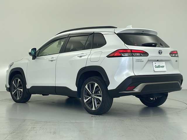 トヨタ カローラ クロス ハイブリッド Z 愛知県 2022(令4)年 1.8万km プラチナホワイトパールマイカ 純正ディスプレイオーディオ(現状ナビ使用可）/パノラミックビューカメラ/ビルトインETC/トヨタセーフティセンス/・レーントレースアシスト/・プリクラッシュセーフティ/・ブラインドスポットモニター/・リアクロストラフィックアラート/・パーキングサポートブレーキ/・ロードサインアシスト/・レーダークルーズコントロール/シートヒーター/パワーシート/ステアリングスイッチ/純正フロアマット/電動格納ウィンカーミラー/オートマチックハイビーム/フロントフォグ/プッシュスタート