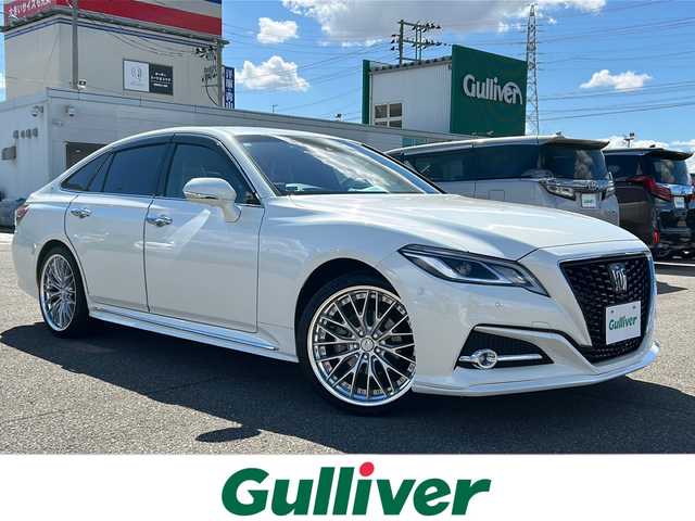 トヨタ クラウン ハイブリッド S Cパッケージ Four 秋田県 2018(平30)年 7.5万km ホワイトパールクリスタルシャイン 純正メモリナビ/Bluetooth、CD/DVD、フルセグTV/全方位カメラ/ETC/前後ドライブレコーダー/レーダークルーズコントロール/レザーシート/前席パワーシート/前席シートヒーター/ステアリングヒーター/社外20インチAW/純正リアスポイラー/ドアバイザー