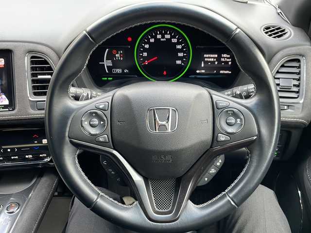 ホンダ ヴェゼル ハイブリッド RS ホンダセンシング 大阪府 2021(令3)年 5.8万km プラチナホワイトパール ワンオーナー/純正8インチナビ/CD/DVD/BTオーディオ/フルセグテレビ/バックカメラ/前席シートヒーター/パドルシフト/ステアリングスイッチ/革巻きステアリング/ETC/ホンダセンシング/電動パーキングブレーキ/オートホールド/LEDヘッドライト/純正18インチAW/フロアマット/ドアバイザー