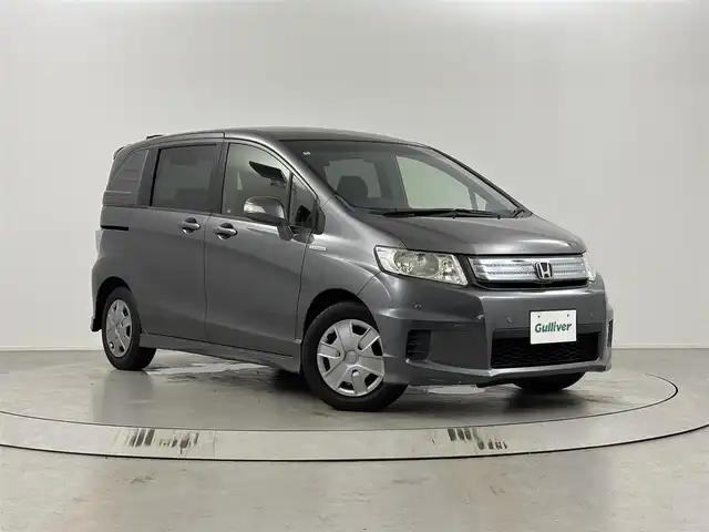 ホンダ フリード スパイク ハイブリット ジャストセレクション 埼玉県 2012(平24)年 5万km ポリッシュドメタルメタリック 純正ナビ/(CD/DVD/USB/AM/FM)/地デジワンセグ/バックカメラ/ETC/クルーズコントロール/クリアランスソナー/両側パワースライドドア/ステアリングリモコン/純正フロアマット