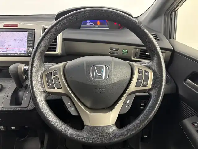 ホンダ フリード スパイク ハイブリット ジャストセレクション 埼玉県 2012(平24)年 5万km ポリッシュドメタルメタリック 純正ナビ/(CD/DVD/USB/AM/FM)/地デジワンセグ/バックカメラ/ETC/クルーズコントロール/クリアランスソナー/両側パワースライドドア/ステアリングリモコン/純正フロアマット
