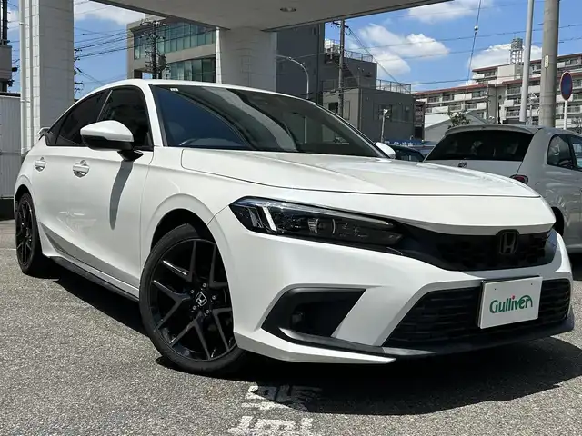 ホンダ シビック EX 愛知県 2021(令3)年 4.5万km プラチナホワイトパール ワンオーナー/純ディスプレイナビテレビ/フルセグテレビ/バックカメラ/ワイヤレス充電/BOSEサウンドシステム/ハーフレザーシート/純18インチAW/アダプティブドライビングビーム/LEDフォグ/リアウィング/前後ドライブレコーダー/ビルドインETC/シートヒーター/新車保証書.取説/スペアキー